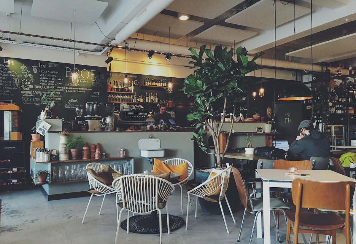 Inside Min Lokal — warm seating, natural light